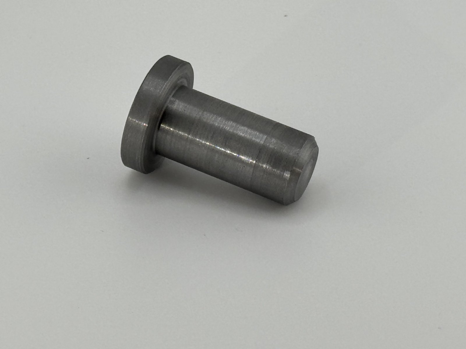 The images below illustrate a “before and after” transformation – showing how our team converts raw bar stock into a precision-engineered component commonly used within tractor systems and agriculture machinery.